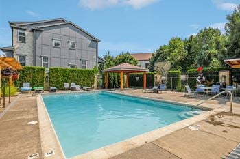 Relaxing resort-style pool with sun deck and spa